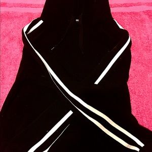Black hoodie with white stripes.